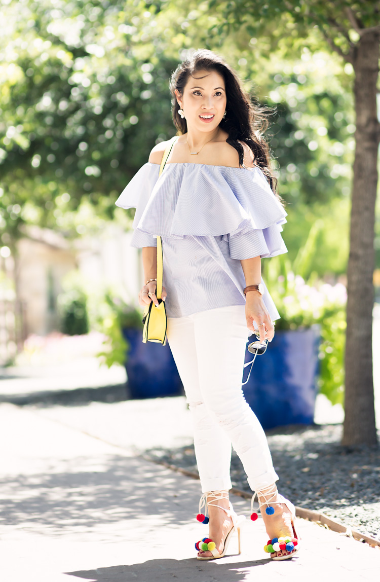 cute & little blog | off-shoulder ruffle check top, white distressed jeans, aquazzura pom pom sandals, yellow crossbody | spring summer outfit