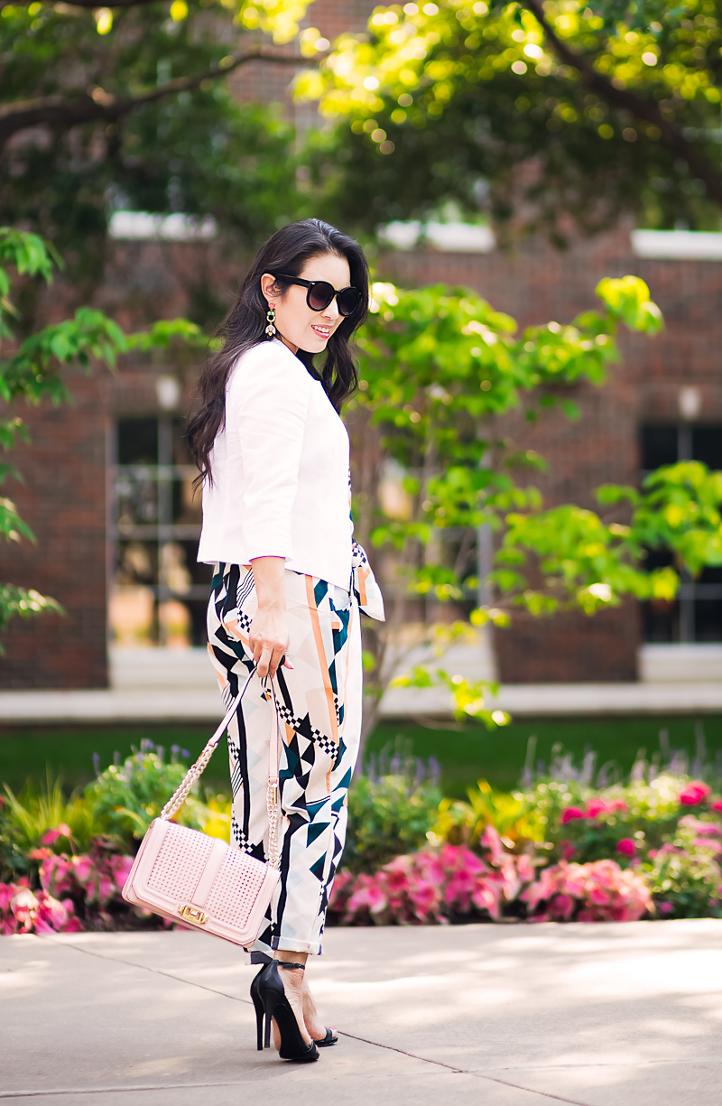 white linen blazer, graphic jumpsuit, black strappy sandals | spring summer work outfit