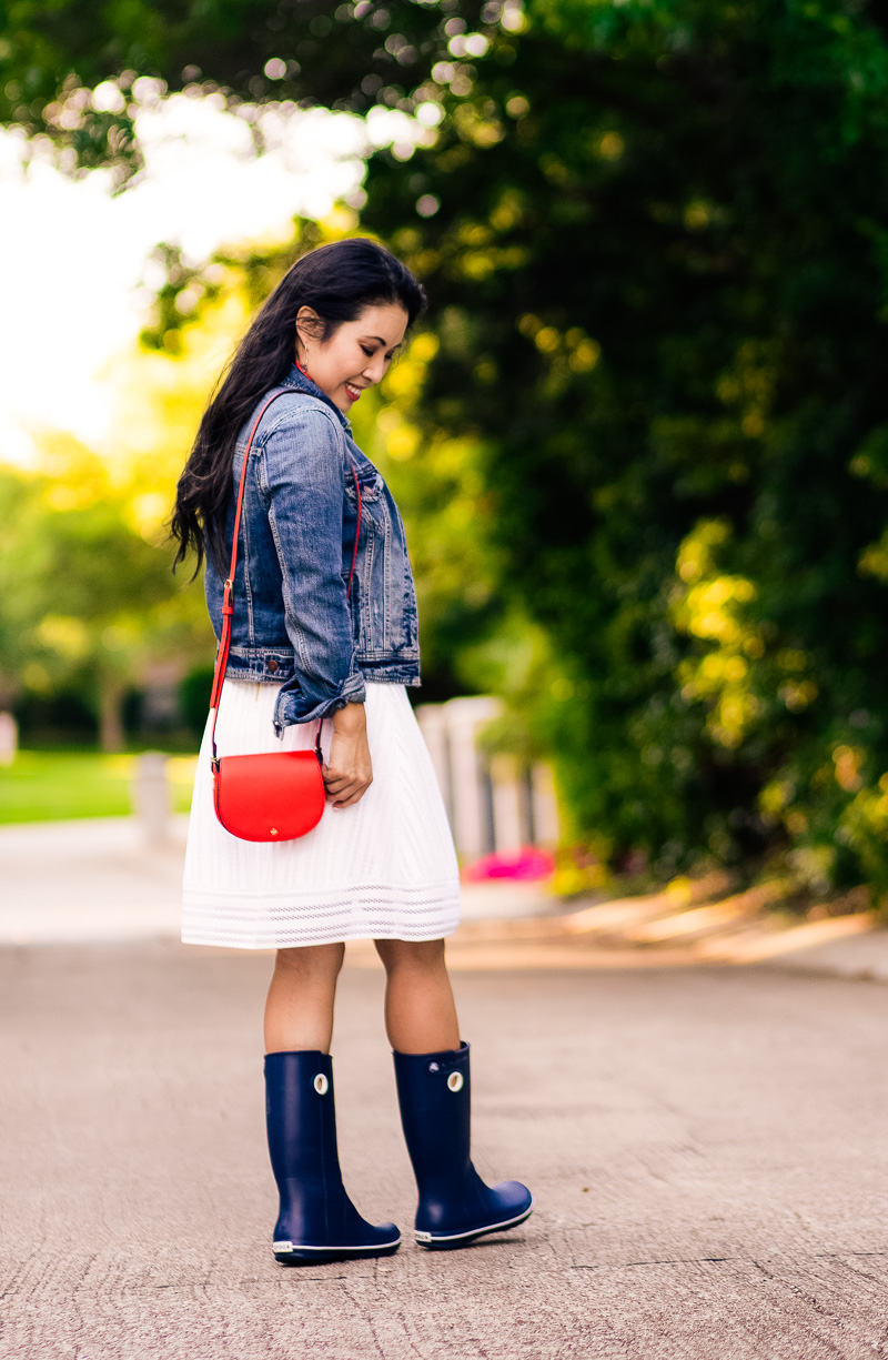 denim jacket, yellow sweater, white eyelet skirt, crocs jaunt rain boots, tory burch red saddle bag, floral neckerchief | spring summer outfit