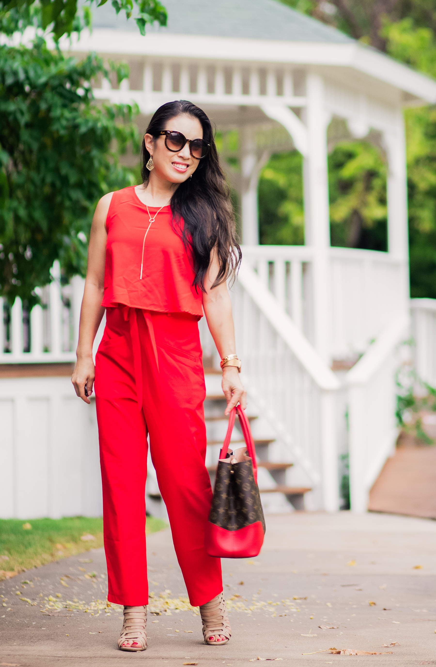 lulu's red halter jumpsuit with louis vuitton belt. Obsessed with