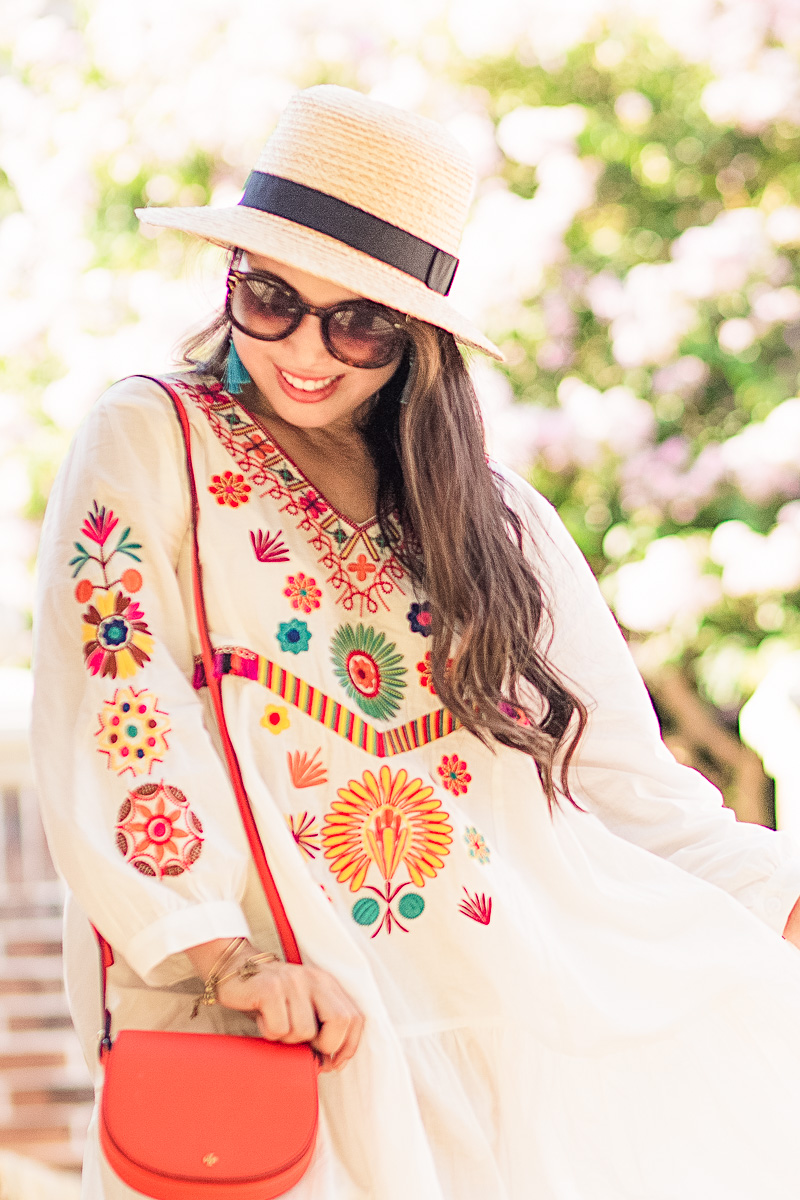 embroidered little white dress, straw hat, red saddlebag | summer beach pool outfit