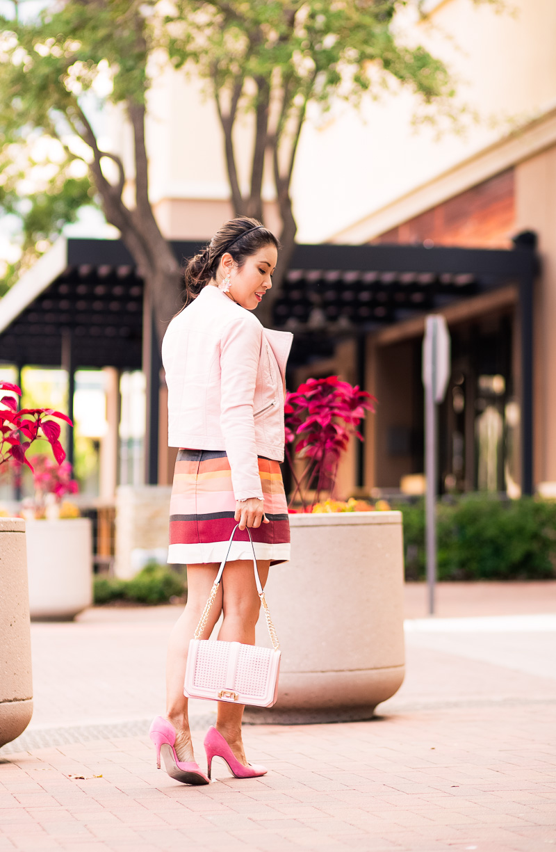 cute & little | petite fashion blog | pink moto jacket, striped mini skirt, pink suede pumps, minkoff love crossbody | spring fall outfit