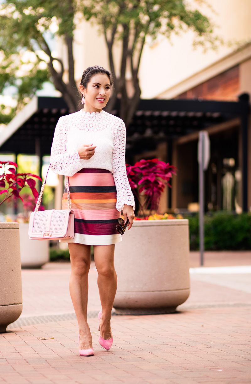 cute & little | petite fashion blog | pink moto jacket, white crochet lace blouse, striped mini skirt, pink suede pumps, minkoff love crossbody | spring fall outfit