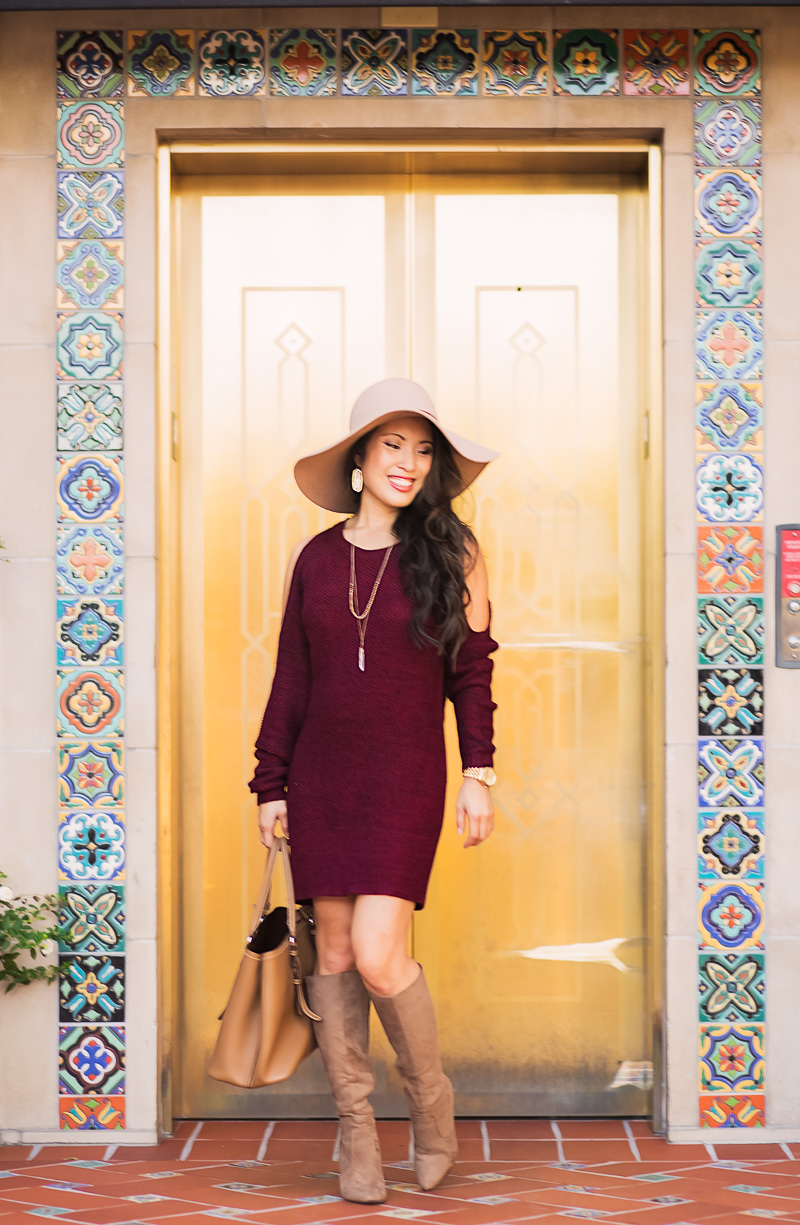 cute & little | petite fashion blog | burgundy cold shoulder sweater dress, suede knee high boots, floppy hat, prada cuir | fall outfit