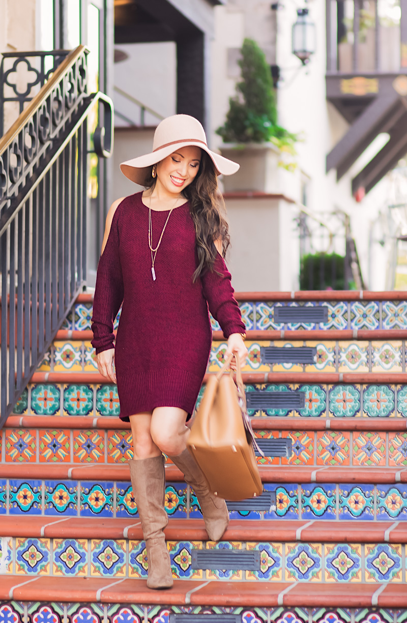 cute & little | petite fashion blog | burgundy cold shoulder sweater dress, suede knee high boots, floppy hat, prada cuir | fall outfit