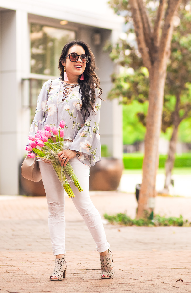 cute & little | dallas petite fashion blog | floral lace-up bell sleeve top, white distressed jeans, rockport total motion perforated bootie, pink tassel earrings | spring outfit - SHOPBOP SALE: 10 Pieces I Own + Recommend by popular Dallas petite fashion blogger cute & little