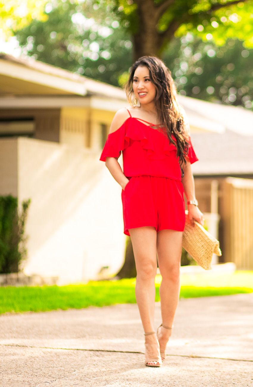 cute & little blog | dallas petite fashion blog | red ruffle crisscross romper, rattan straw clutch | summer festive outfit