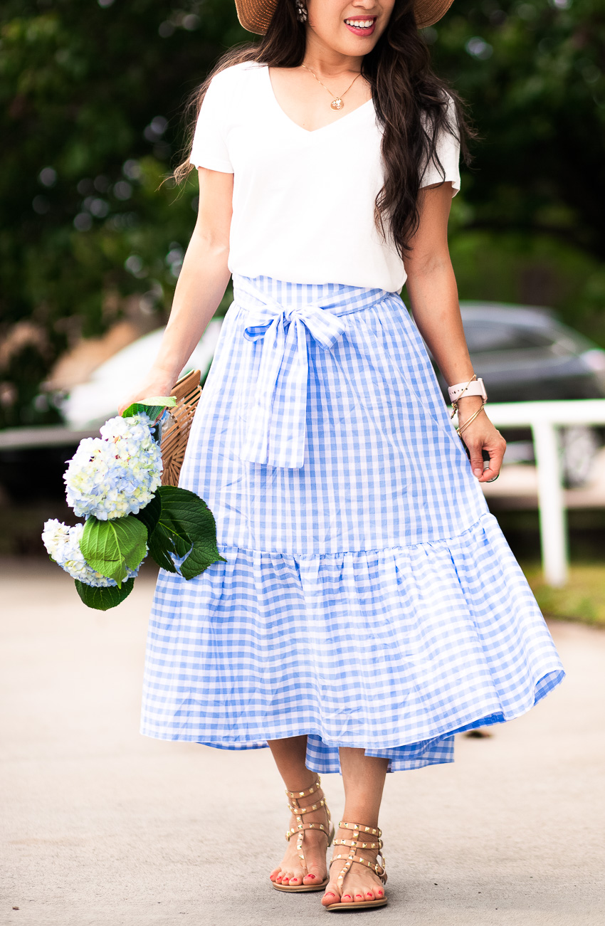 Gingham Ruffles // How To Tie A Perfect Bow by cute & little | dallas petite fashion blog | white v-neck tee, gingham ruffle skirt, boater hat, studded sandals | casual summer outfit