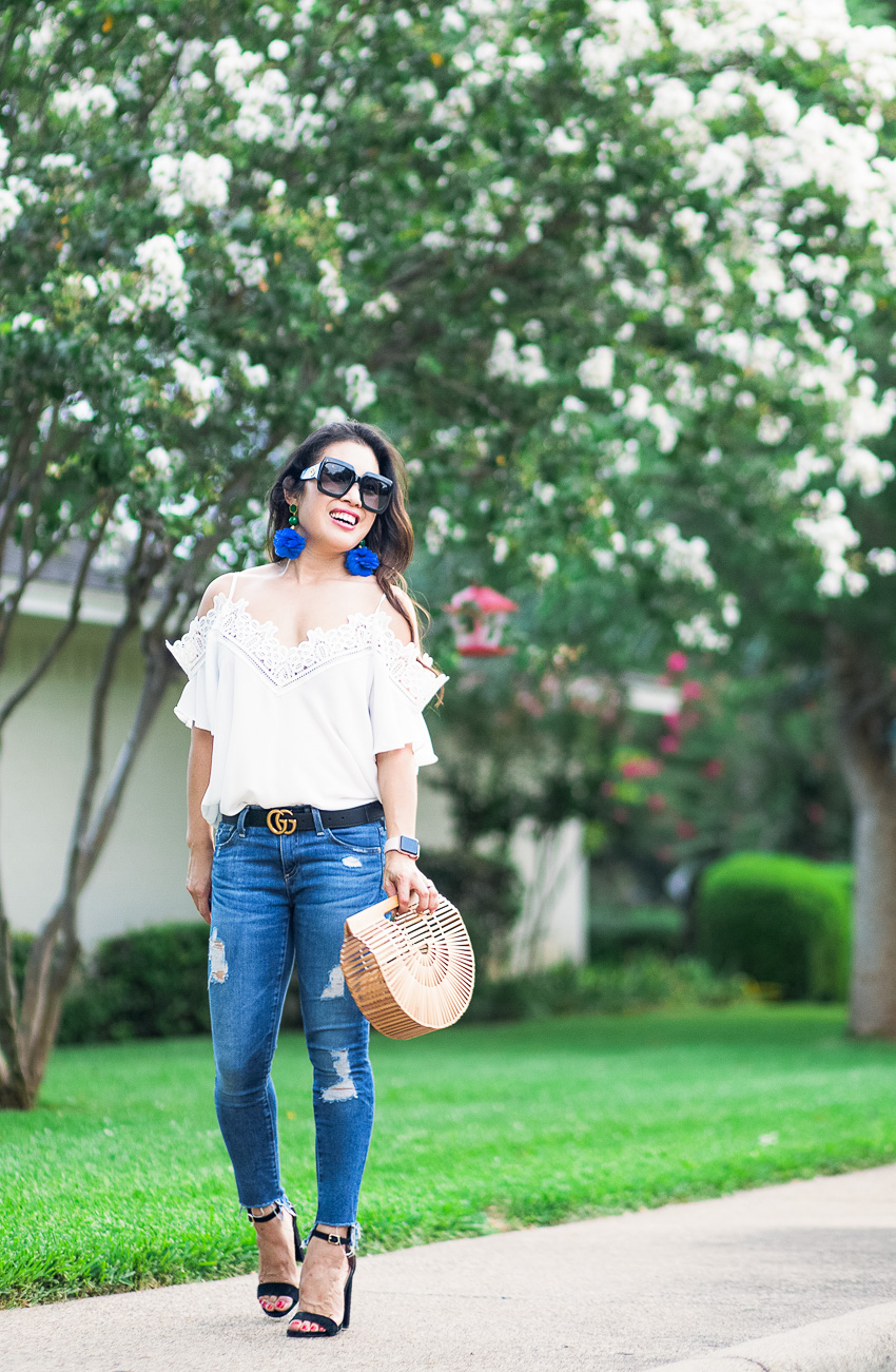 cute & little blog | crochet open-shoulder top, tory burch feather drop earrings, petite distressed step hem jeans | summer outfit - Finding Forever 21 Promo Codes by Dallas fashion blogger cute and little