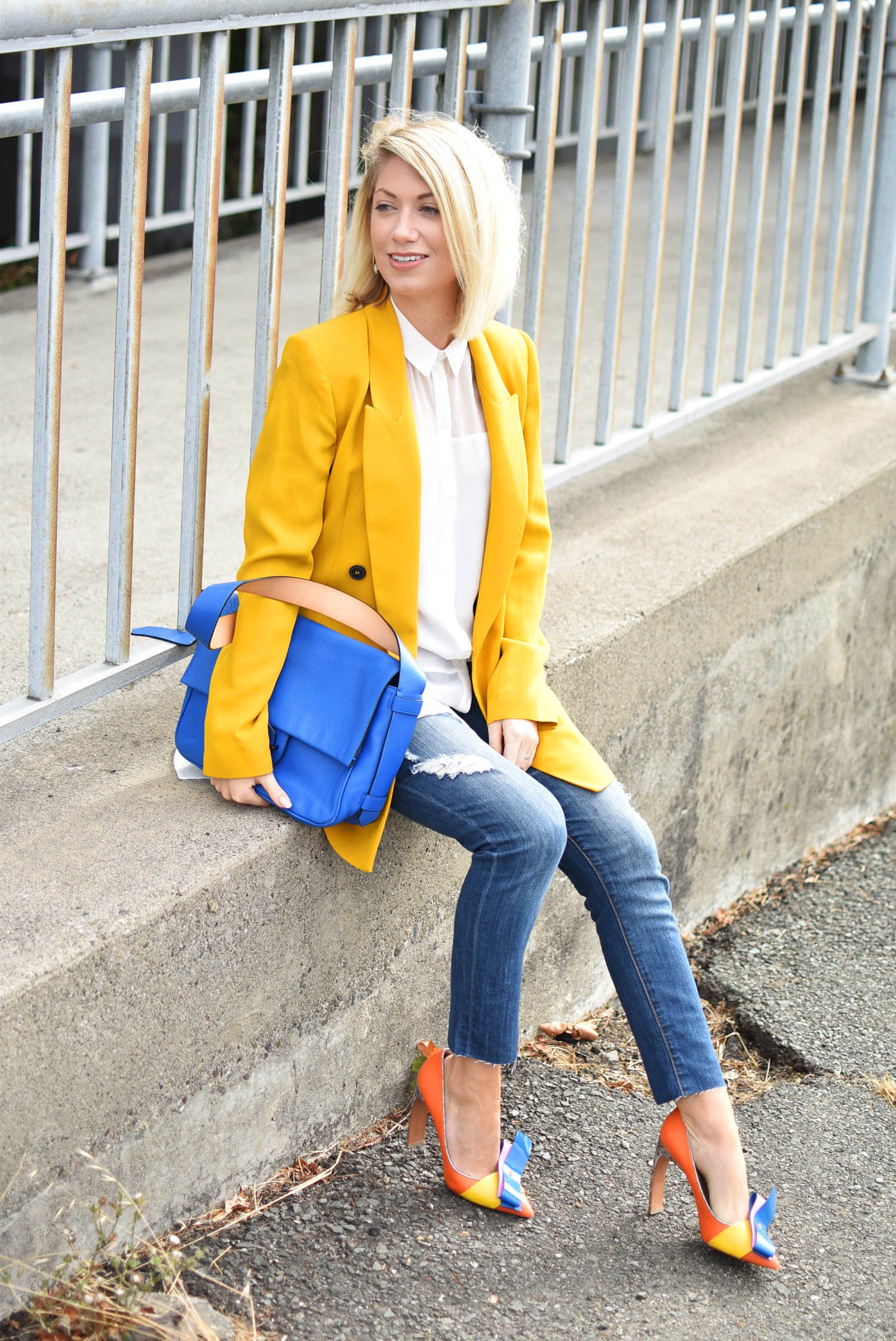 vibrant yellow blazer jeans outfit