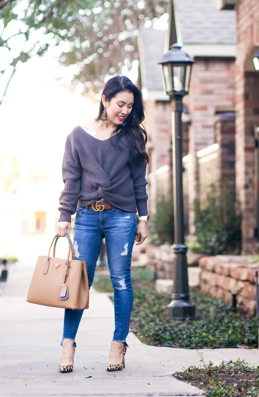 cute & little | petite dallas fashion blogger | front twist sweater, gucci double g belt, ag step hem jeans, prada cuir bag, leopard pumps, j.crew sparkle teardrop earrings | fall winter outfit - Twist Front Top and Beaded Details by popular Dallas petite fashion blogger cute & little