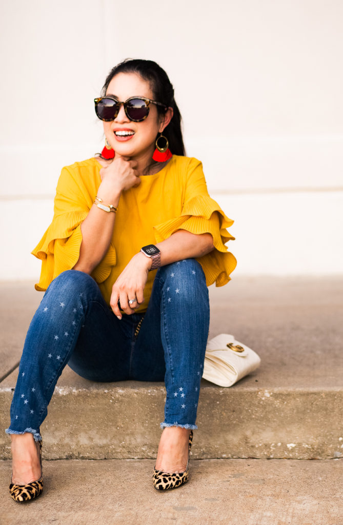 loft star frayed skinny crop jeans, leopard pumps, kinsley armelle cherry red fringe earrings | LOFT | Abercrombie | J. Crew Factory | Starstruck: Outfits For The Star Print Obsessed featured by popular Dallas petite fashion blogger Cute & Little