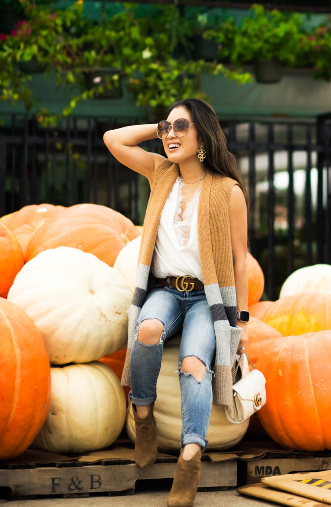 All The Fall Feels: Layering With A LOFT Sweater Vest featured by Dallas petite fashion blogger Cute & Little | loft coloblock pocket sweater vest, lace top, blanknyc busted knee jeans, vince camuto movinta bootie, chloe milla sunglasses | fall output