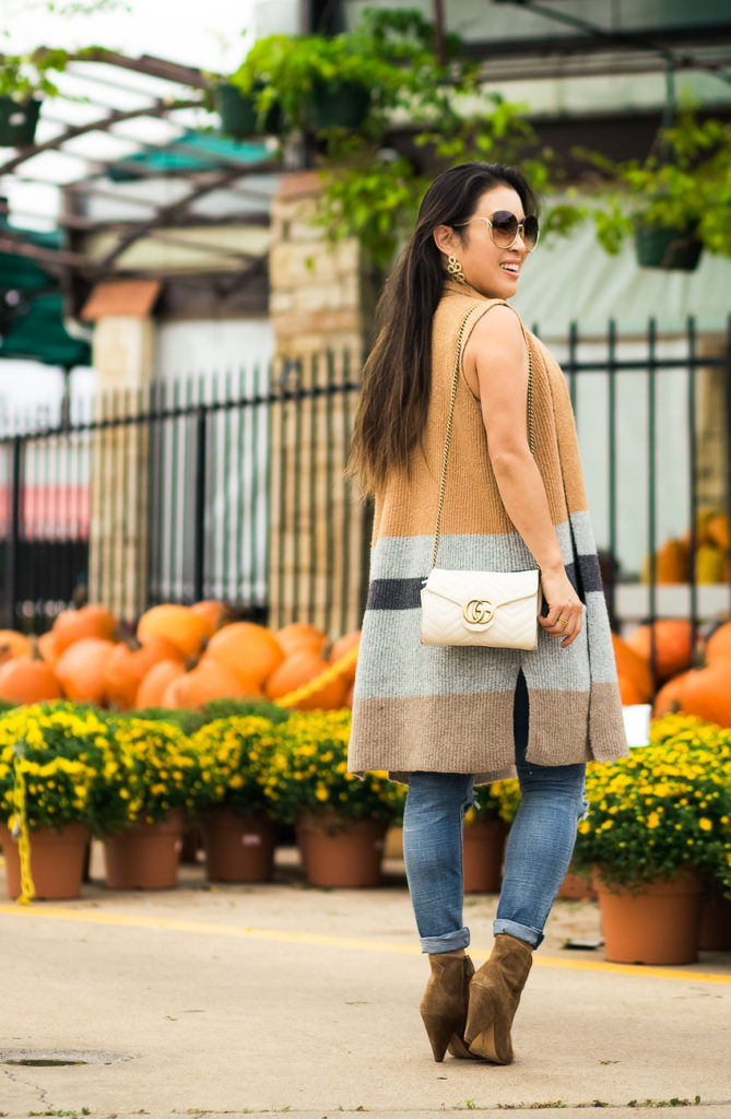 All The Fall Feels: Layering With A LOFT Sweater Vest featured by Dallas petite fashion blogger Cute & Little | loft coloblock pocket sweater vest, lace top, blanknyc busted knee jeans, vince camuto movinta bootie, chloe milla sunglasses | fall output