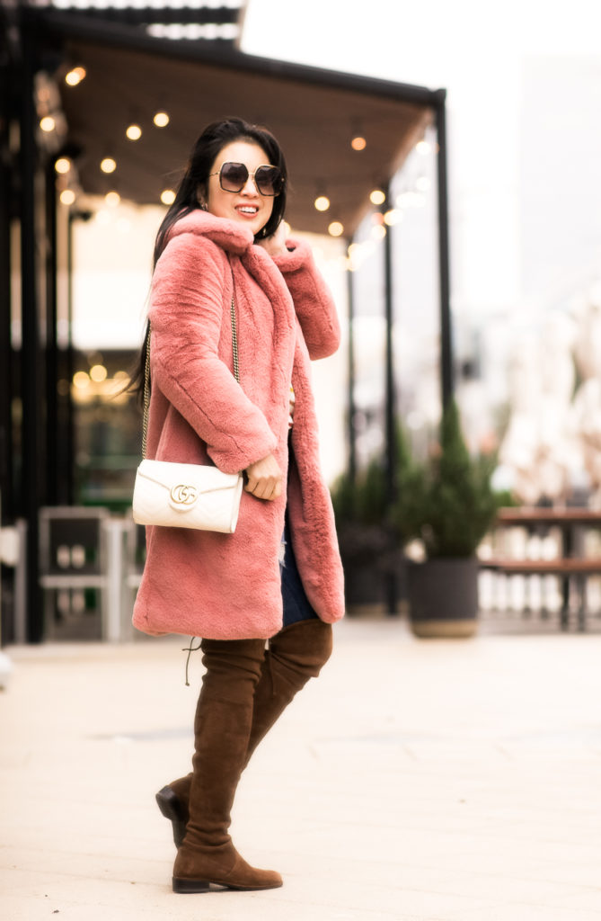 j.crew pink faux fur coat, red dress boutique grey stripe sweater, ag distressed jeans, stuart weitzman walnut lowland over the knee boots, gucci double g belt, baublebar primina flower earrings | winter outfit |  Stylish In The Cold: Pink Faux Fur Coat featured by top Dallas petite fashion blog Cute & Little 