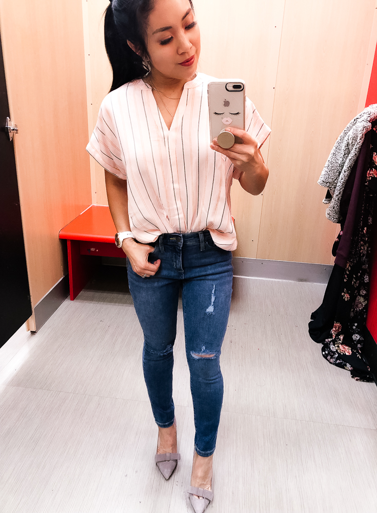 Shopping at Target featured by top US fashion blog Cute & Little; Image of a woman wearing Target Universal Thread Striped Twist Front Top, Target High Rise Crop Skinny Jeans, Ann Taylor 'Odette' Bow Pumps, Sugarfix for Baublebar Lariat Bow necklace, Garmin 'vivomove' HR watch.