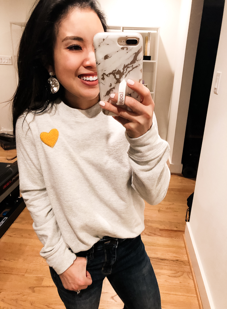 LOFT Try-On featured by top US fashion blog Cute & Little; Image of woman wearing LOFT Lou & Grey Heart Patch Sweatshirt, American Eagle Ne(x)t Level Super High Waisted Jegging, Vince 'Blair' Sneakers, Baublebar 'Safiya' earrings and Too Faced Melted Matte Lipstick in Queen B.