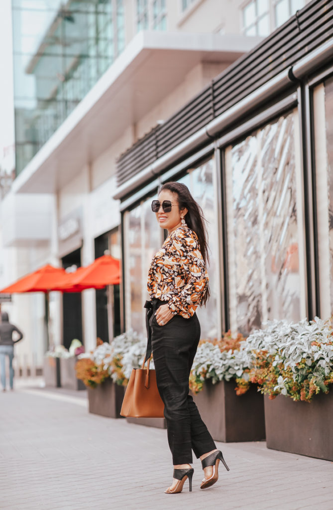 Personal goals featured by top US lifestyle blog, Cute & Little; image of woman wearing Loft Shirttail blouse, Express ankle pant, Prada bag, Gucci sunglasses, Baublebar earrings