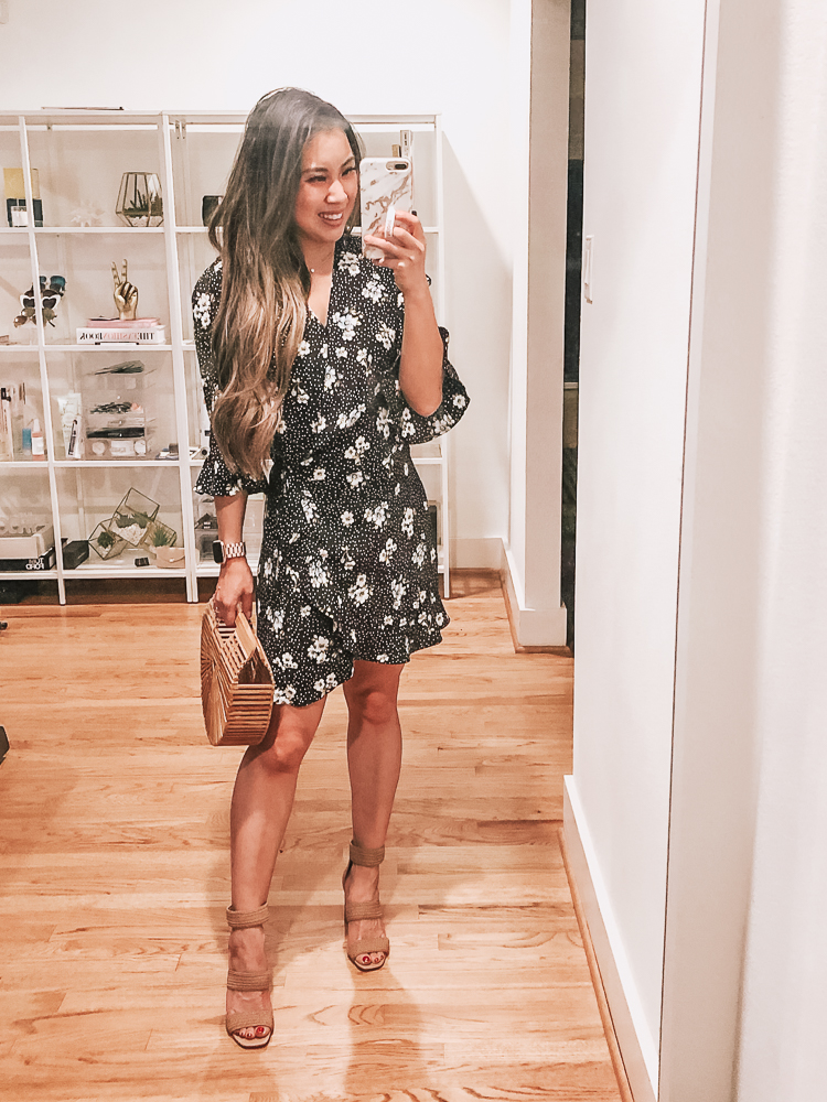 LOFT Sale featured by top US petite fashion blog Cute & Little; Image of a woman wearing LOFT floral wrap skirt romper and Steve Madden shoes.