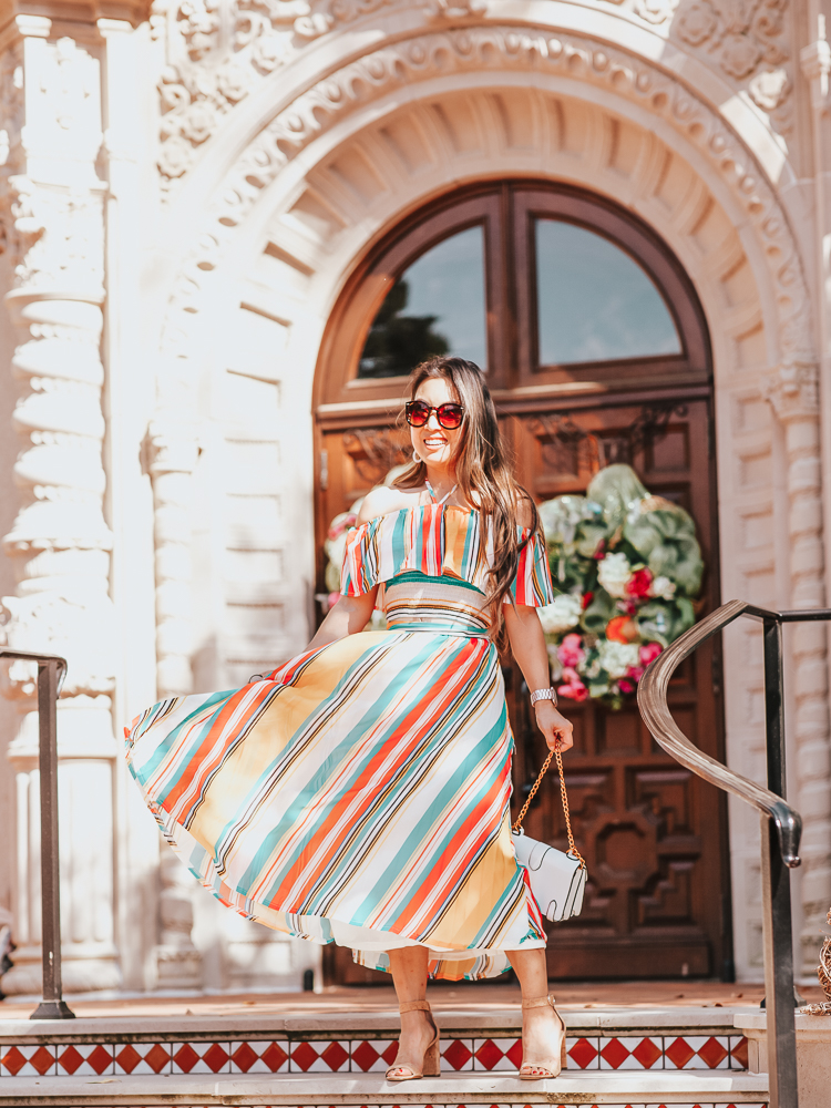 Spring Refresh featured by top US lifestyle blog Cute & Little; Image of a woman wearing a red dress boutique luau with me stripe 2-piece dress set