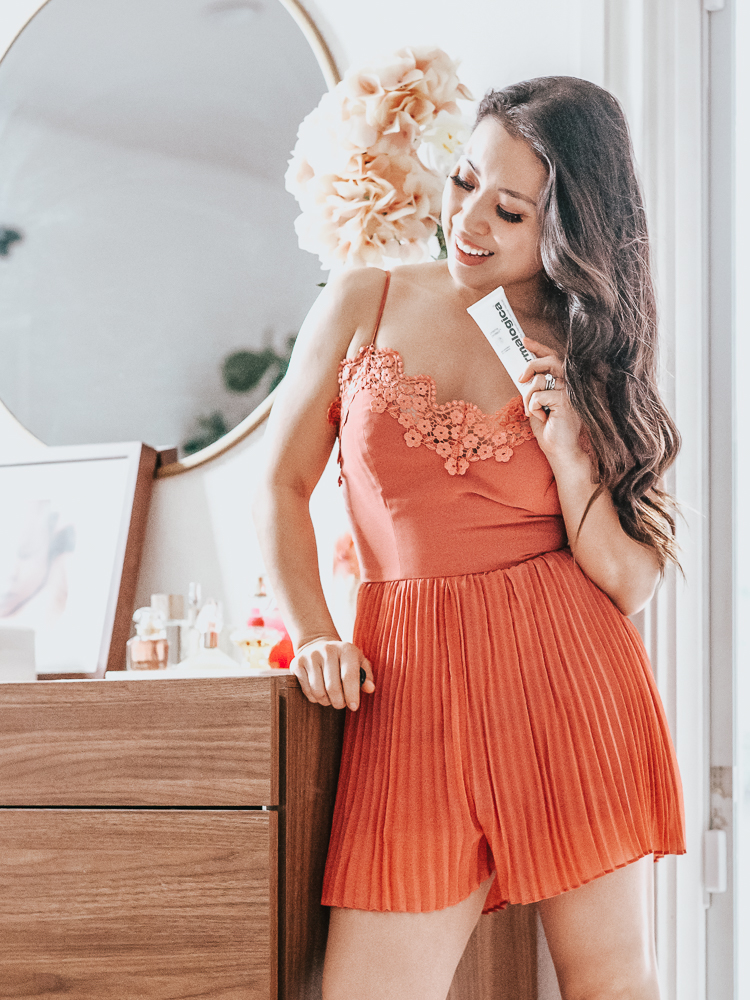 Spring Refresh featured by top US lifestyle blog Cute & Little; Image of a woman wearing an Amazon pleated romper.