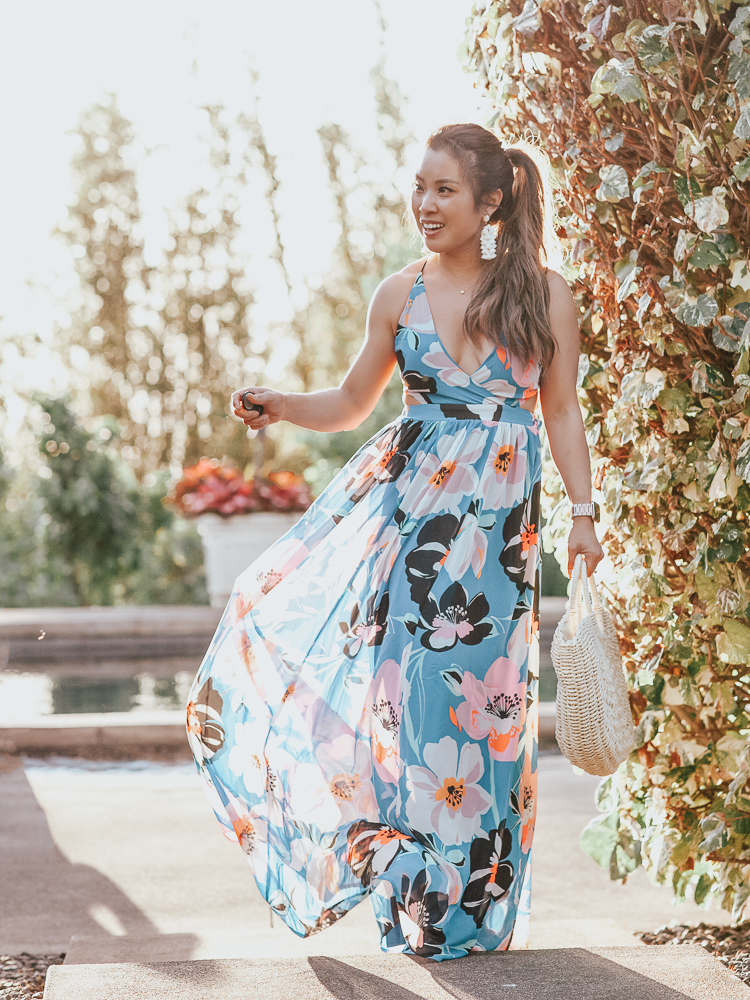Blue Floral Maxi Dress featured by top US fashion blog Cute & Little; Image of a woman wearing Express Strappy Lace-Up Cut-Out Maxi Dress worn with these Bristols nipple covers, See By Chloe 'Glyn' Espadrilles, Amazon Straw Tote Bag and Baublebar 'Contessa' Tassels earrings.
