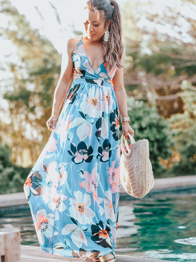 Blue Floral Maxi Dress featured by top US fashion blog Cute & Little; Image of a woman wearing Express Strappy Lace-Up Cut-Out Maxi Dress worn with these Bristols nipple covers, See By Chloe 'Glyn' Espadrilles, Amazon Straw Tote Bag and Baublebar 'Contessa' Tassels earrings.