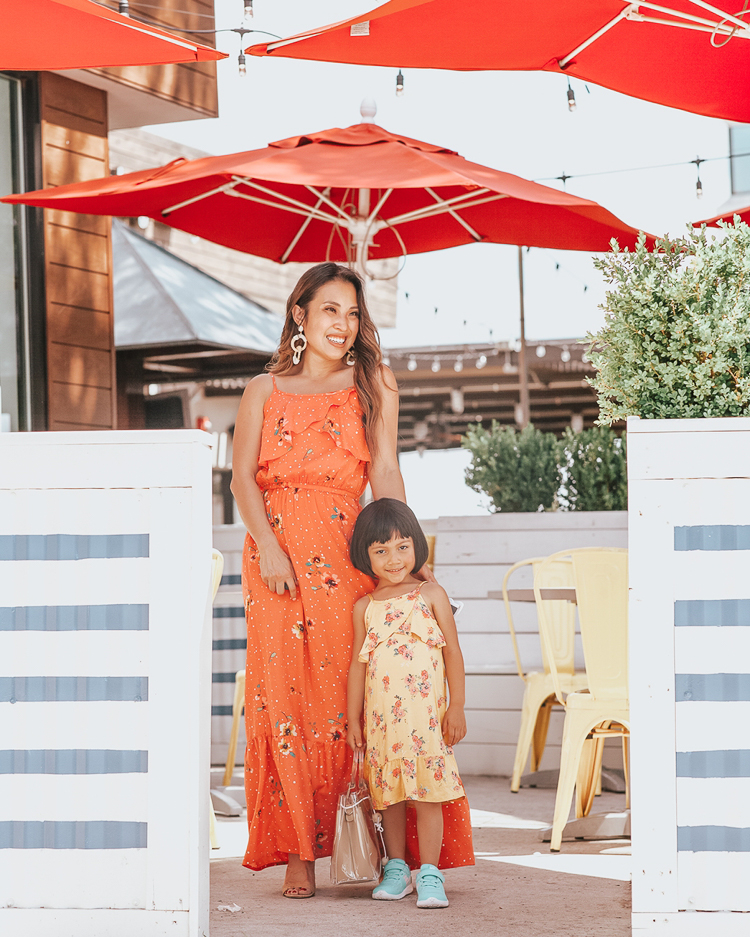 Memorial Day Outfits featured by top US fashion blog Cute & Little; Image of a woman and her daughter wearing jcpenney peyton & parker mommy and me matching dresses.