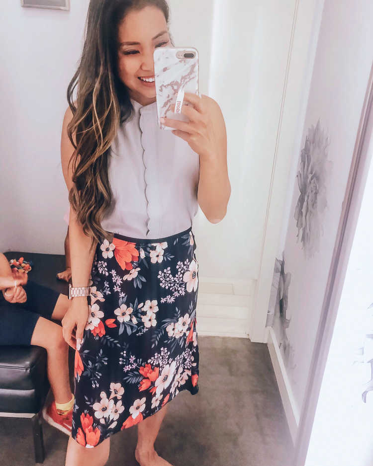 Ann Taylor Flash Sale featured by top US fashion blog Cute & Little; Image of a woman wearing ann taylor scallop placket shell and ann taylor floral cluster flare skirt.