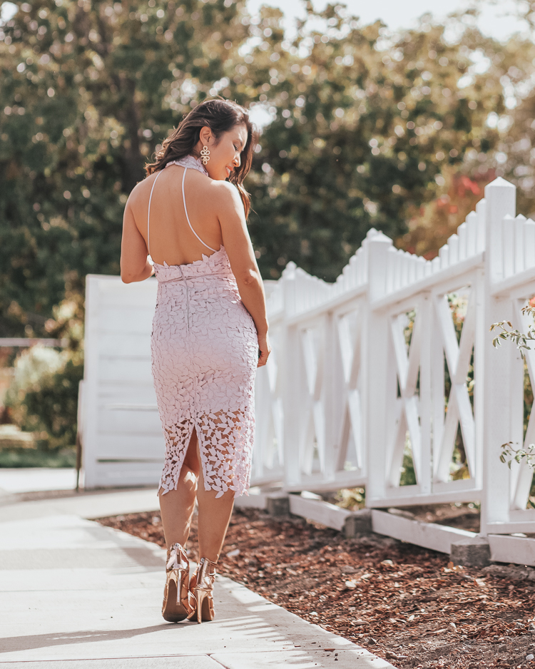 Summer Wedding Guest Dresses featured by top US petite fashion blog Cute & Little; Image of a woman wearing bardot gemma orchid lace crochet halter dress and BP shoes.