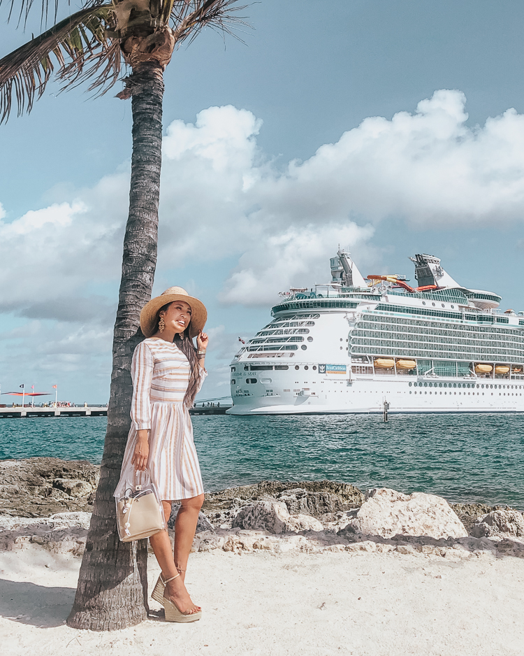 First Time Cruise Tips featured by top US travel blog Cute & Little; Image of a woman wearing Amazon dress and Steve Madden shoes.