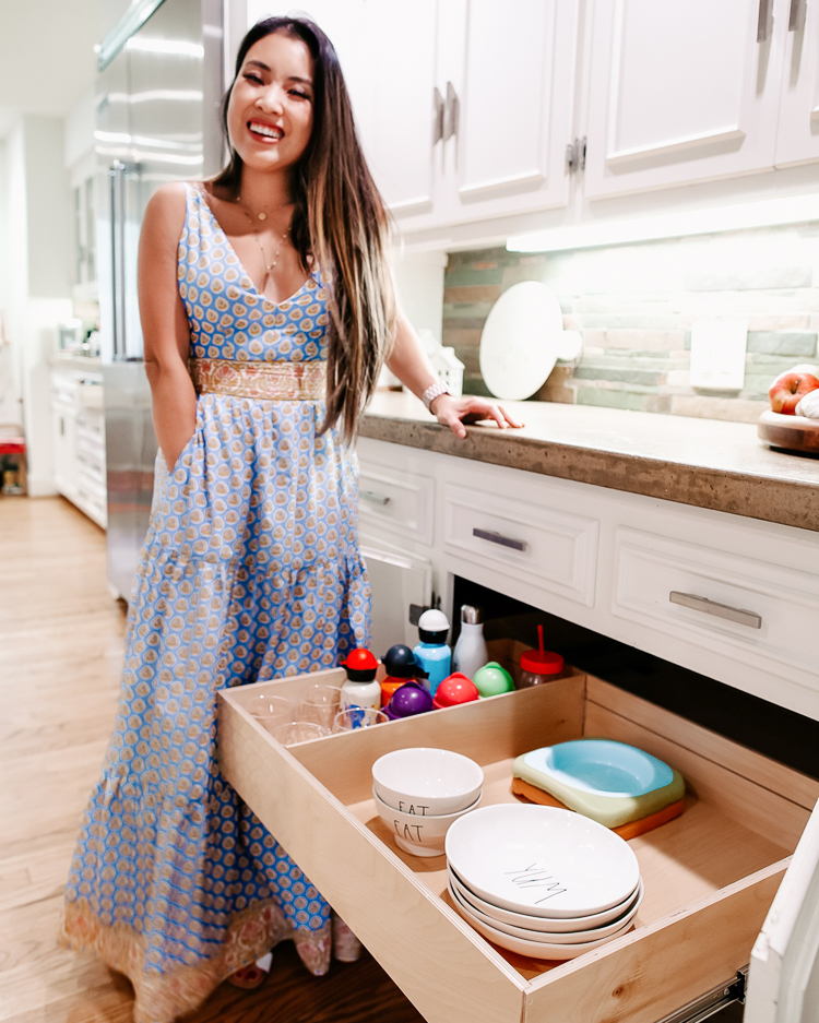 cute & little | popular dallas home blogger | shelfgenie home improvement organization review | quick and easy tips to organize your kitchen | Quick Kitchen Organization Tips with ShelfGenie by popular Dallas petite fashion blog, Cute and Little: image of a woman in her kitchen standing next to her ShelfGenie drawers and wearing a J.Crew Tiered Maxi, Panacea Gold Circle Layered Necklace, and Steve Madden 'Greece' Slides.