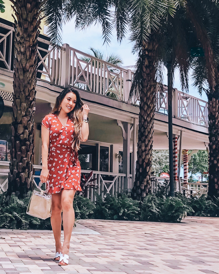 First Time Cruise Tips featured by top US travel blog Cute & Little; Image of a woman wearing LOFT romper and Steve Madden sandals.