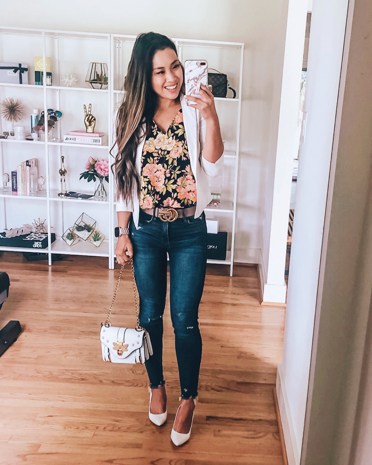 LOFT Favorites featured by top US petite fashion blog Cute & Little; Image of a woman wearing loft floral strappy cami, white blazer and abercrombie high rise jeans.