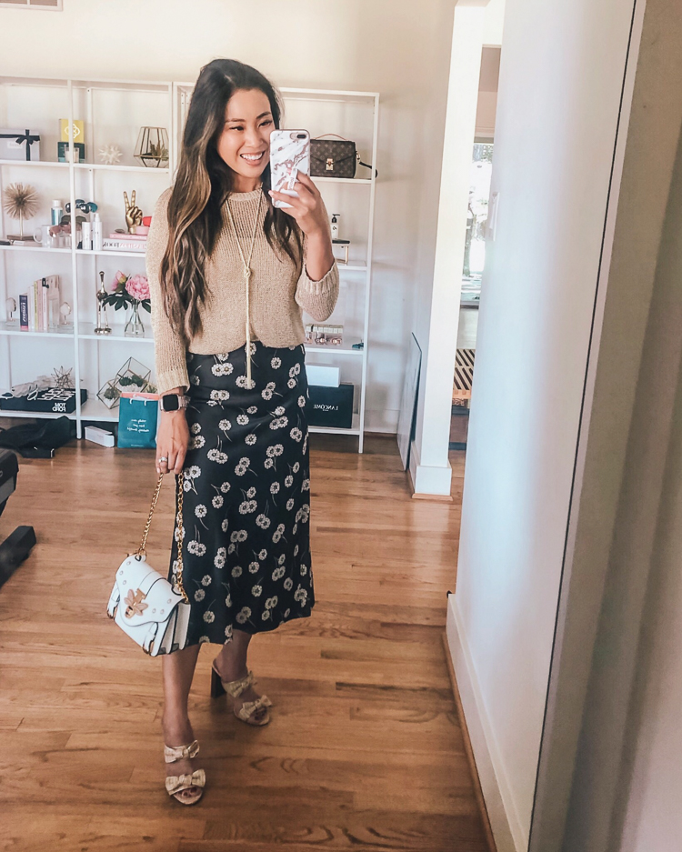 LOFT Favorites featured by top US petite fashion blog Cute & Little; Image of a woman wearing loft shimmer open knit sweater and loft daisy chain midi skirt.