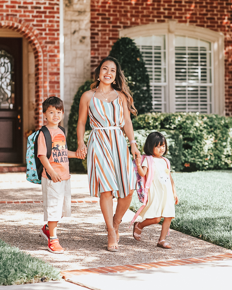 cute & little | popular dallas fashion family blog | cute affordable back to school outfits walmart | 2 Cute Back-To-School Outfits With Walmart by popular Dallas petite fashion blog, Cute and Little: image of a mom and her two kids wearing back-to-school outfits from Walmart while standing in front of their house.