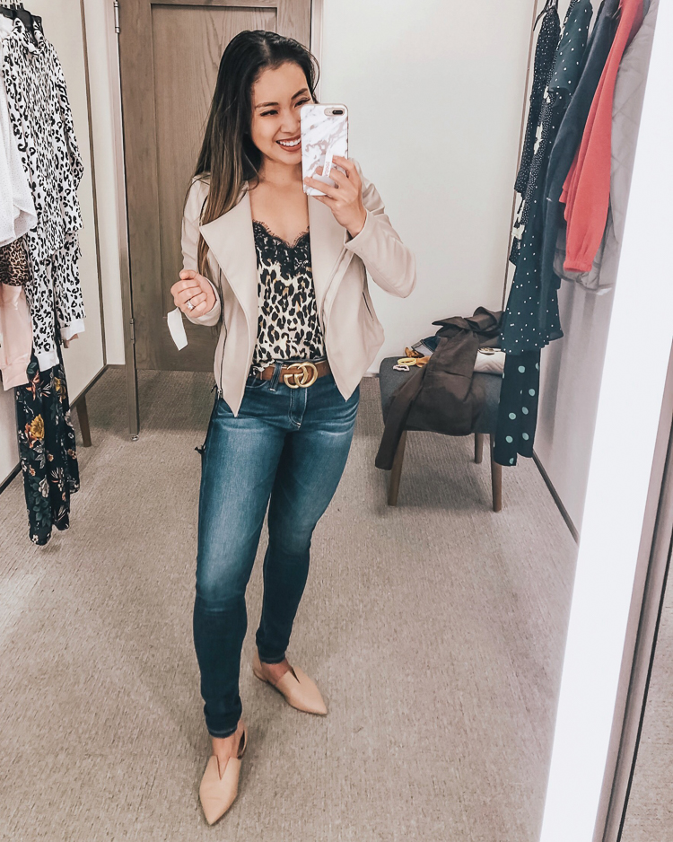 cute & little | dallas popular petite fashion blog | nordstrom anniversary sale 2019 dressing room try-on | blanknyc record breaker collarless faux leather moto jacket, bp leopard lace trim satin cami, ag farrah jeans | best of 2019 nsale | Nordstrom Anniversary Sale Try-On by popular Dallas petite fashion blog, Cute and Little: image of a woman in a Nordstrom dressing room wearing a BlankNYC Record Breaker Collarless Moto Jacket.