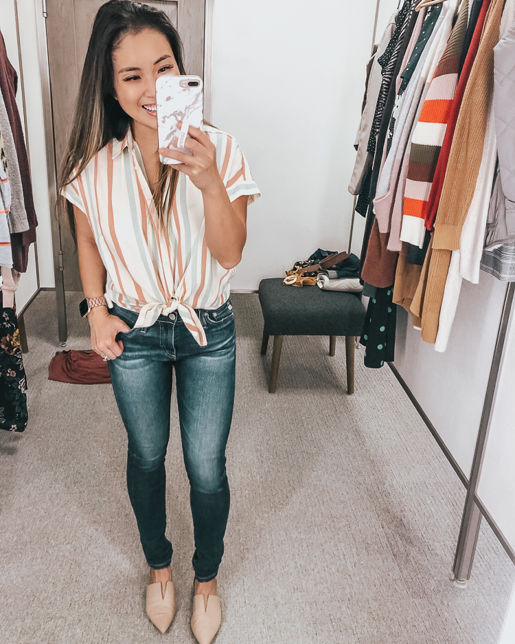 cute & little | dallas popular petite fashion blog | nordstrom anniversary sale 2019 dressing room try-on | madewell central multistripe front knot shirt, ag farrah skinny jeans | best of 2019 nsale | Nordstrom Anniversary Sale Try-On by popular Dallas petite fashion blog, Cute and Little: image of a woman in a Nordstrom dressing room wearing a Madewell Central Multistripe Shirt.