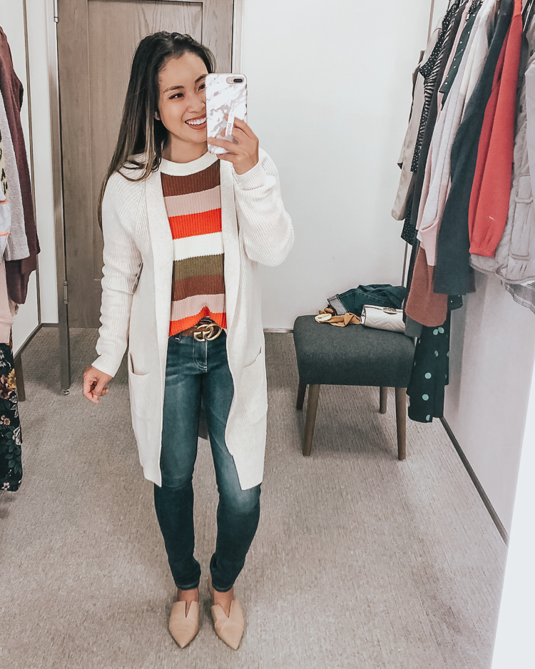 cute & little | dallas popular petite fashion blog | nordstrom anniversary sale 2019 dressing room try-on | bp ribbed longline cardi, madewell stripe pullover sweater, ag farrah jeans | best of 2019 nsale | Nordstrom Anniversary Sale: Dressing Room Try-On + Giveaway! by popular Dallas petite fashion blog, Cute and Little: image of a woman in a dressing room wearing a BP Longline Open Cardigan in beige oatmeal light heather, Madewell Patch Pocket Pullover Sweater, AG 'Farrah' Skinny Jeans, Gucci Double G, and Vince 'Darlington' Flats. 