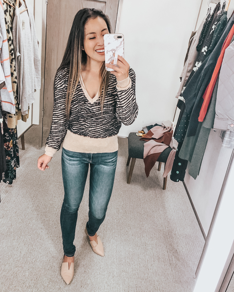 cute & little | dallas popular petite fashion blog | nordstrom anniversary sale 2019 dressing room try-on | astr the label tiger stripe sweater, ag farrah jeans | best of 2019 nsale | Nordstrom Anniversary Sale Try-On by popular Dallas petite fashion blog, Cute and Little: image of a woman in a Nordstrom dressing room wearing a Astr the Label Tiger Stripe Sweater.