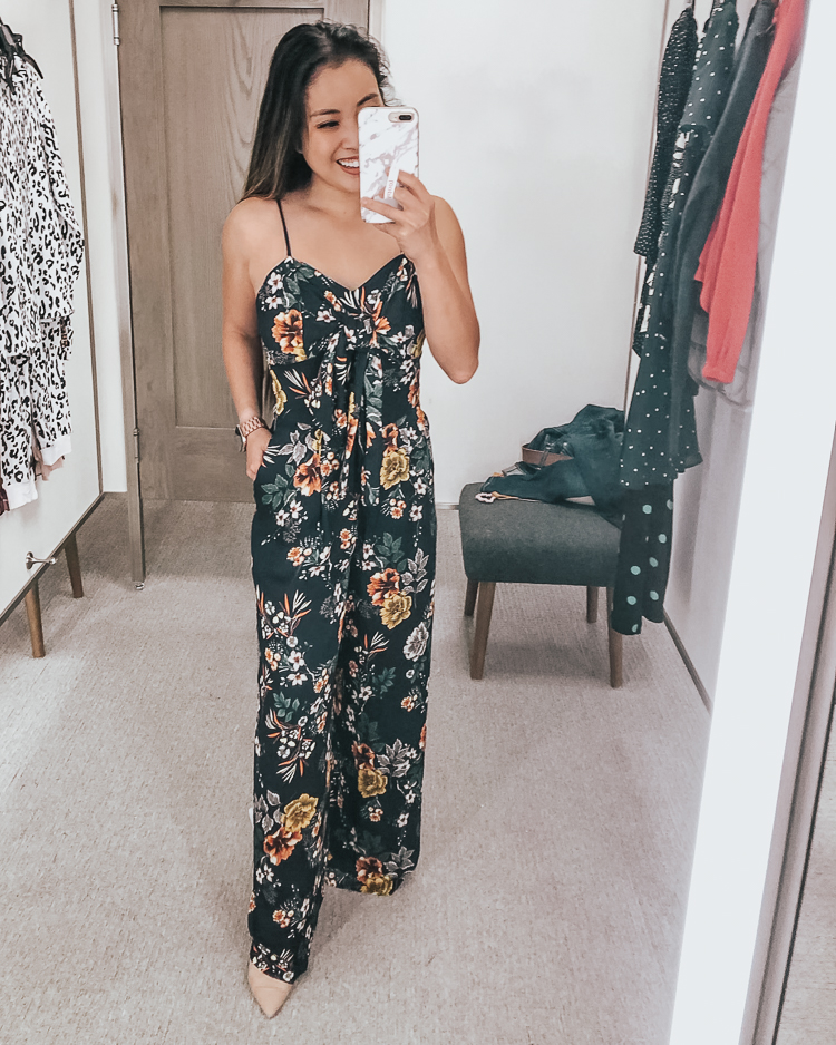 cute & little | dallas popular petite fashion blog | nordstrom anniversary sale 2019 dressing room try-on | chelsea28 floral print bow wide leg jumpsuit | best of 2019 nsale | Nordstrom Anniversary Sale Try-On by popular Dallas petite fashion blog, Cute and Little: image of a woman in a Nordstrom dressing room wearing a Chelsea28 Floral Print Bow Jumpsuit