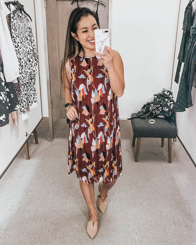 cute & little | dallas popular petite fashion blog | nordstrom anniversary sale 2019 dressing room try-on | halogen burgundy floral pleated shift dress | best of 2019 nsale | Nordstrom Anniversary Sale Try-On by popular Dallas petite fashion blog, Cute and Little: image of a woman in a Nordstrom dressing room wearing a Halogen Pleated Shift Dress.