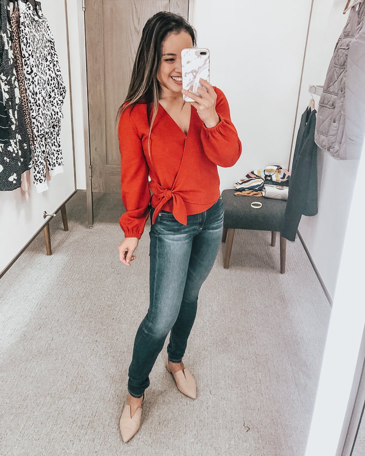 cute & little | dallas popular petite fashion blog | nordstrom anniversary sale 2019 dressing room try-on | madewell texture & thread crepe wrap top bright ember, ag farrah skinny jeans | best of 2019 nsale | Nordstrom Anniversary Sale: Dressing Room Try-On + Giveaway! by popular Dallas petite fashion blog, Cute and Little: image of a woman in a dressing room wearing Madewell Texture & Thread Crepe Wrap Top and AG Farrah Skinny Jeans. 