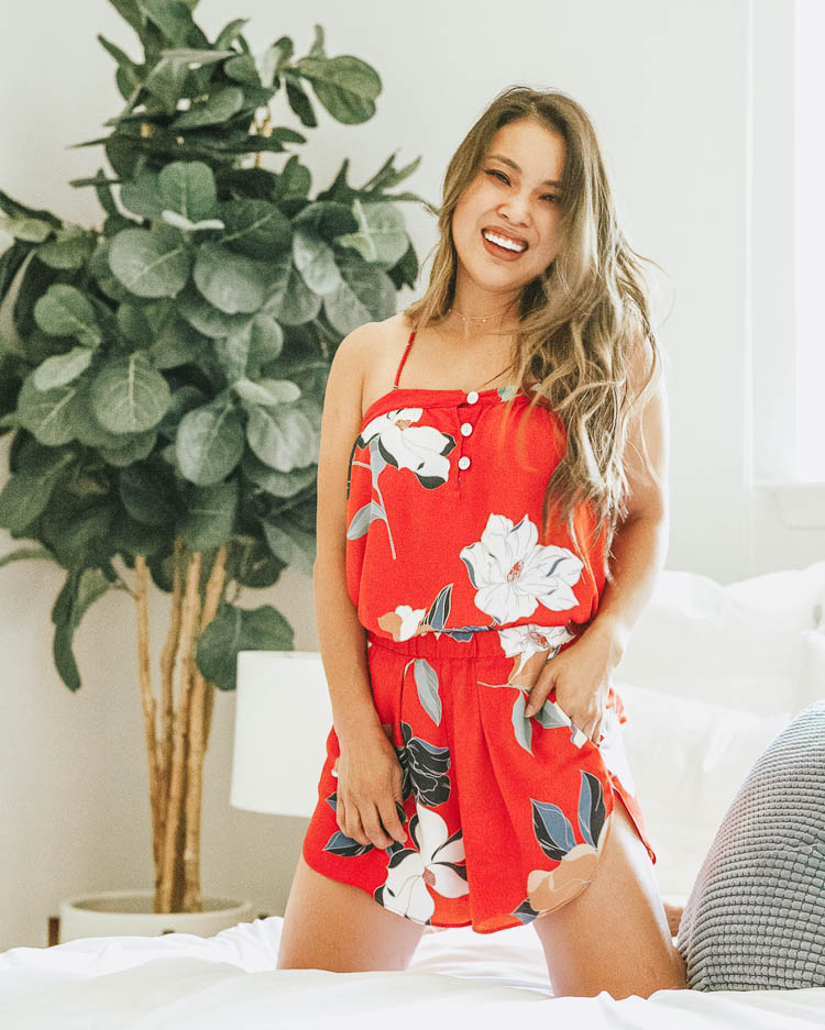 cute & little | popular dallas fashion blog | maison du joir iris red floral pajama set | shopbop stock up sale picks | Shopbop Sale of the Season: 8 Pieces I Own + Recommend by popular Dallas petite fashion blog, Cute and Little: image of a woman kneeling on a bed and wearing a Maison du Soir Pajama Set.