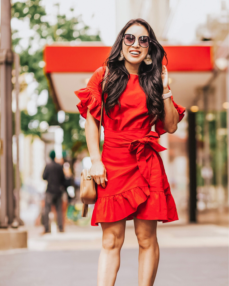 cute & little | august 2019 top sellers | amazon red ruffle wrap dress | August 2019 Top Sellers by popular Dallas petit fashion blog, Cute and Little: image of a woman wearing a Amazon Youxiua Womens Wrap Ruffle Dresses Short Sleeve Casual Party Empire Waist Belts Mini Dress.