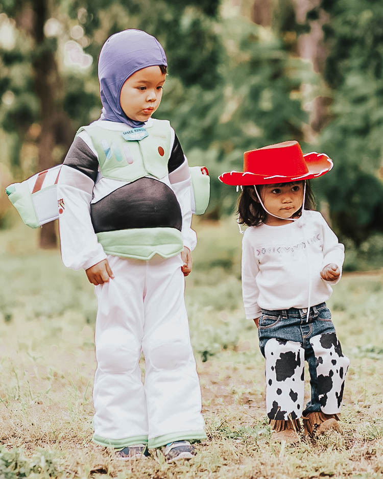 cute & little | dallas family fashion blog | family 4 group halloween costume idea | toy story kids costume idea | Last Minute Halloween Costumes for Families by popular Dallas petite life an style blog, Cute and Little: image of a little boy dressed up as Toy Story's Buzz and a little girl dressed up as Toy Story's Jesse. 