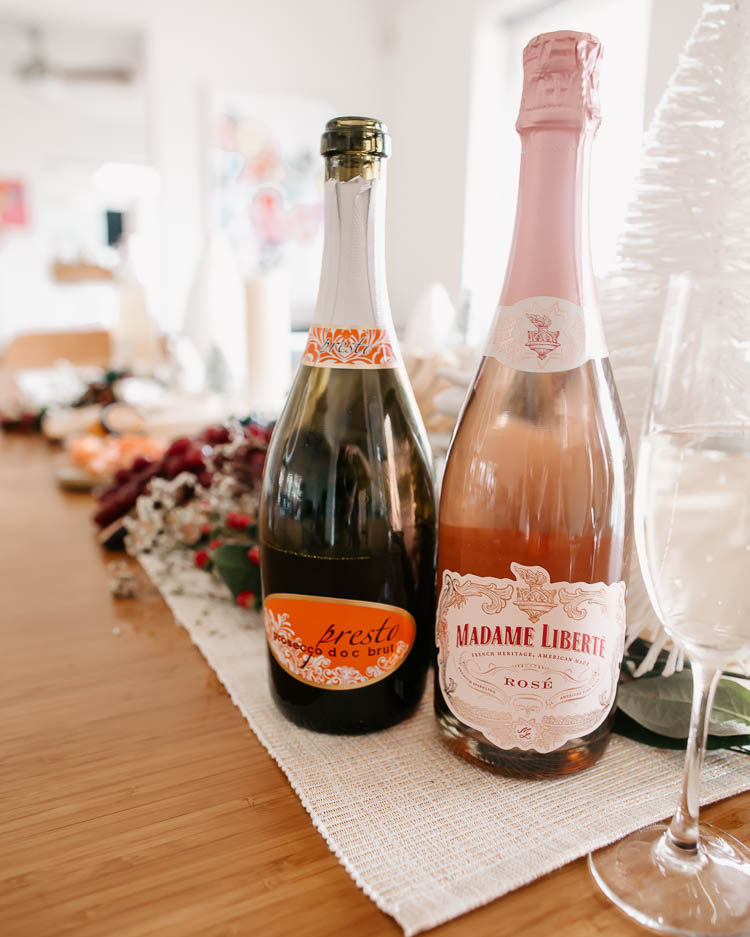 cute & little | dallas mom lifestyle blog | how to throw no-cook holiday new years party whole foods affordable | prosecco rose wine | How-To Throw Holiday Party with No Cook Appetizers by popular Dallas life and style blog, Cute and Little: image of Whole Foods Presto Prosecco Brut and Whole Foods Madame Liberte, Sparkling Rose.