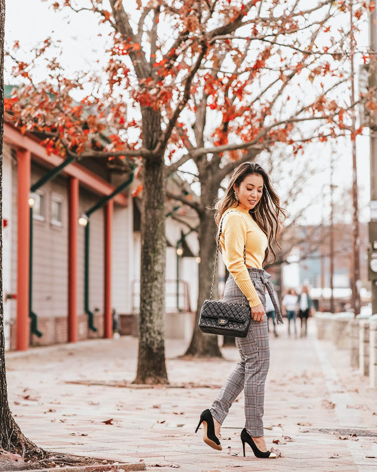 cute & little | dallas petite fashion blog | j.crew yellow ruffle neck sweater, shein paperbag glen plaid pants | work office business casual outfit | Paperbag Plaid Pants-The Pants You'll Be Wearing To Work Every Week by popular Dallas petite fashion blog, Cute and Little: image of a woman wearing a J. Crew Wool-blend ruffle-neck sweater, SheIn SHEIN Paperbag Waist Plaid Cigarette Pants, J. Crew Crystal fabric-backed earrings, Shopbop What Goes Around Comes Around.