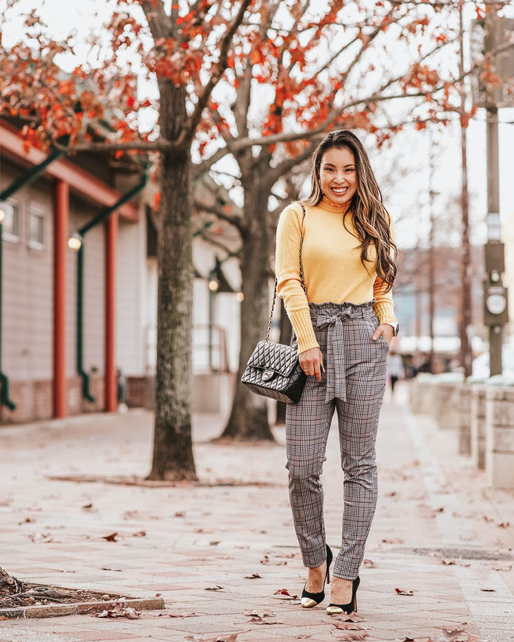 cute & little | dallas petite fashion blog | j.crew yellow ruffle neck sweater, shein paperbag glen plaid pants | work office business casual outfit | Paperbag Plaid Pants-The Pants You'll Be Wearing To Work Every Week by popular Dallas petite fashion blog, Cute and Little: image of a woman wearing a J. Crew Wool-blend ruffle-neck sweater, SheIn SHEIN Paperbag Waist Plaid Cigarette Pants, J. Crew Crystal fabric-backed earrings, Shopbop What Goes Around Comes Around.