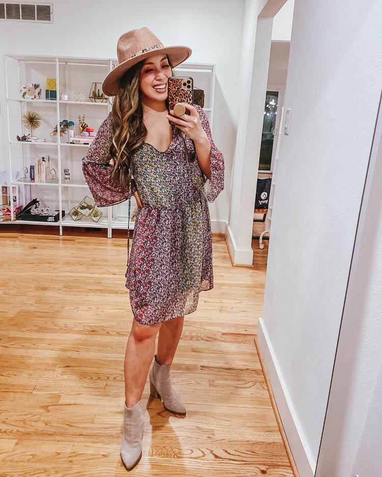 cute & little | dallas petite fashion blog | dailylook try-on review | winter spring outfits | floral boho dress, felt hat | DailyLook Box Try-On Review by popular Dallas petite fashion blog, Cute and Little: image of a woman wearing a Dailylook BCBGENERATION CONFETTI FLORAL A-LINE DRESS, Nordstrom Rack Treasure & Bond Snakeskin Trim Wool Panama Hat, Zappos Marc Fisher LTD Alva, and holding a smartphone in a Amazon Sonix Watercolor Leopard Case for iPhone 11. 